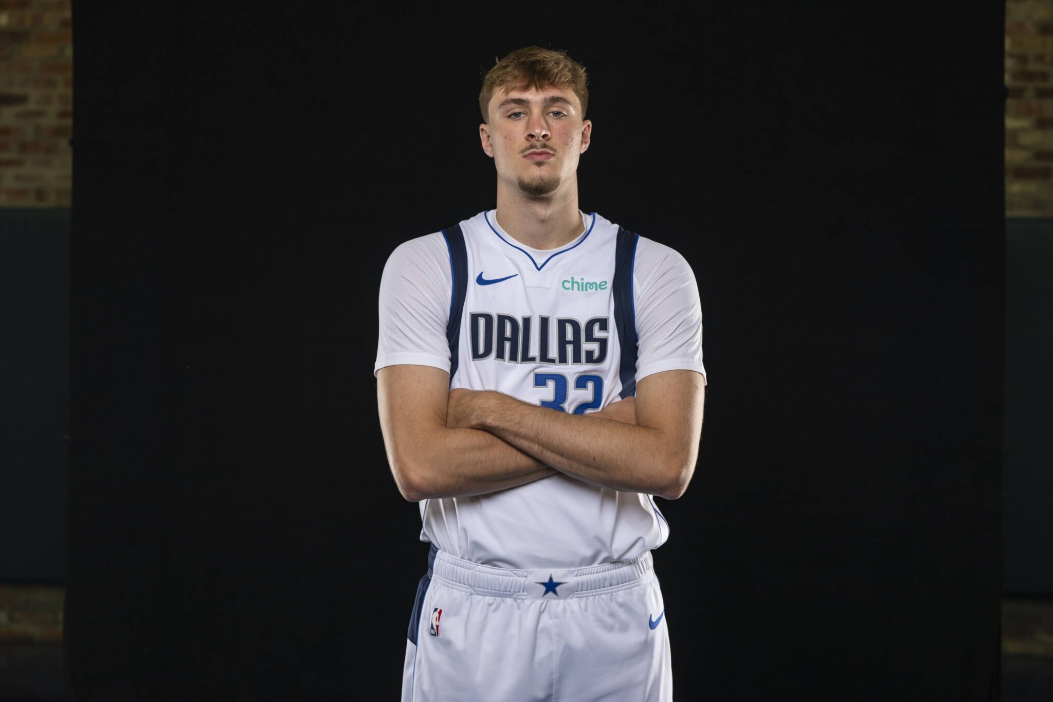 Sep 29, 2025; Dallas, TX, USA; Dallas Mavericks forward Cooper Flagg (32) poses for a photo during the Mavericks 2025 media day at the American Airlines Center. Mandatory Credit: Jerome Miron-Imagn Images