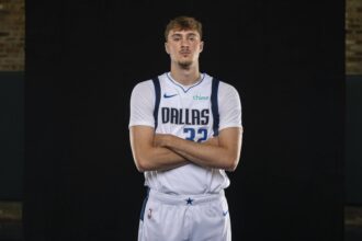 Sep 29, 2025; Dallas, TX, USA; Dallas Mavericks forward Cooper Flagg (32) poses for a photo during the Mavericks 2025 media day at the American Airlines Center. Mandatory Credit: Jerome Miron-Imagn Images