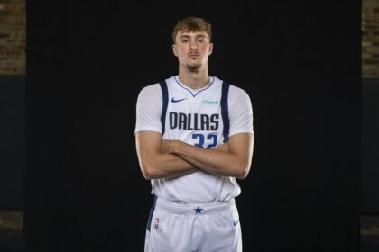 Sep 29, 2025; Dallas, TX, USA; Dallas Mavericks forward Cooper Flagg (32) poses for a photo during the Mavericks 2025 media day at the American Airlines Center. Mandatory Credit: Jerome Miron-Imagn Images