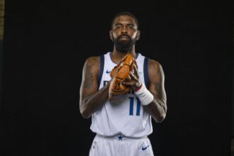 Sep 29, 2025; Dallas, TX, USA; Dallas Mavericks guard Kyrie Irving (11) poses for a photo during the Mavericks 2025 media day at the American Airlines Center. Mandatory Credit: Jerome Miron-Imagn Images