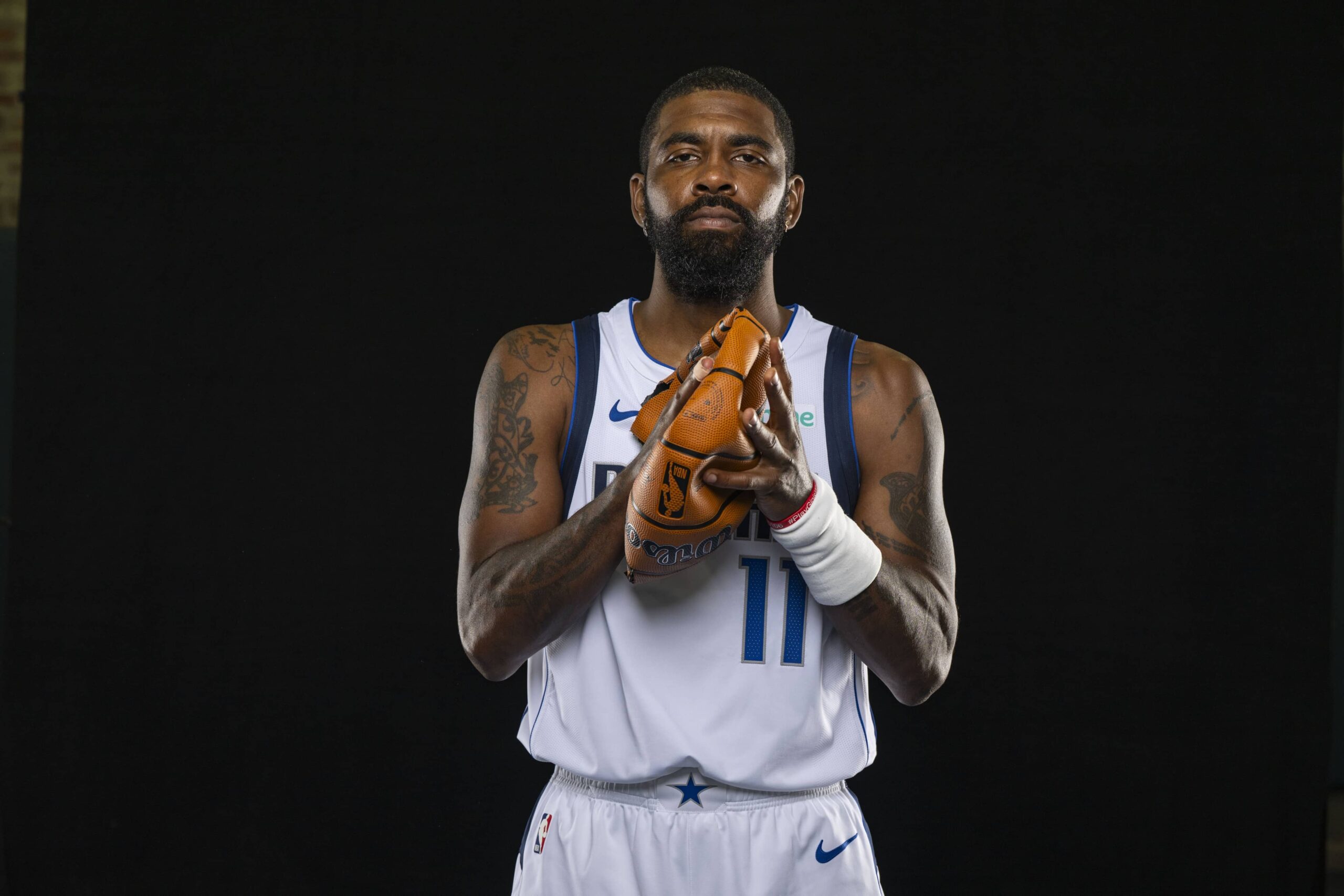 Sep 29, 2025; Dallas, TX, USA; Dallas Mavericks guard Kyrie Irving (11) poses for a photo during the Mavericks 2025 media day at the American Airlines Center. Mandatory Credit: Jerome Miron-Imagn Images