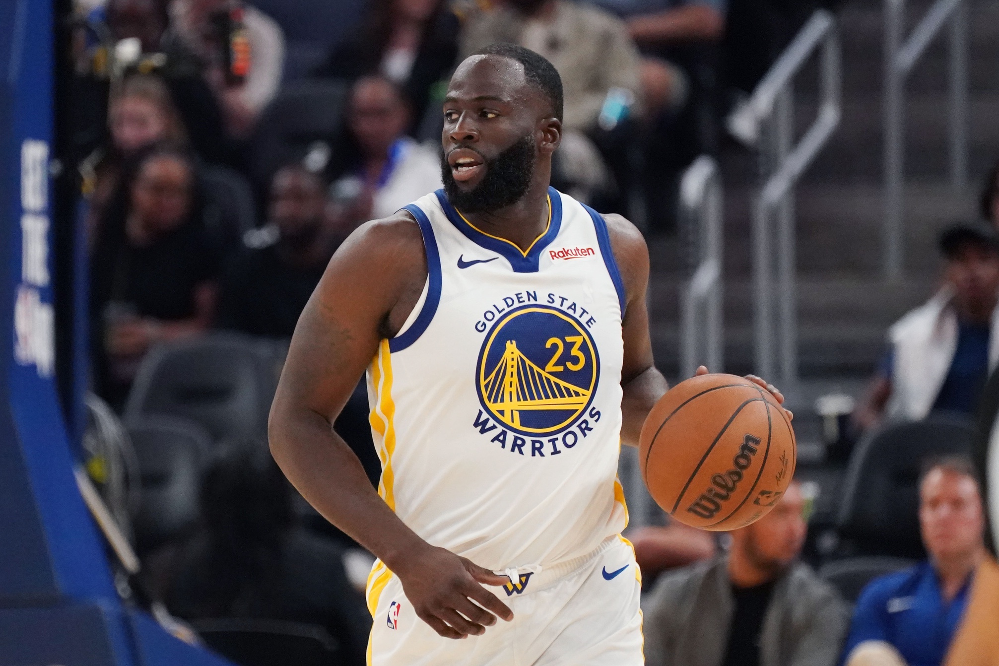 Golden State Warriors forward Draymond Green (23) dribbles upcourt against the Los Angeles Lakers in the second quarter at Chase Center.