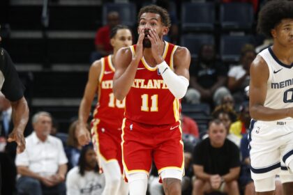 Atlanta Hawks guard Trae Young (11) reacts during the third quarter against the Memphis Grizzlies at FedExForum. Mandatory Credit: Petre Thomas-Imagn Images
