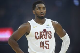 Cleveland, Ohio, USA; Cleveland Cavaliers guard Donovan Mitchell (45) stands on the court in the first quarter against the Detroit Pistons at Rocket Arena. Mandatory Credit: David Richard-Imagn Images