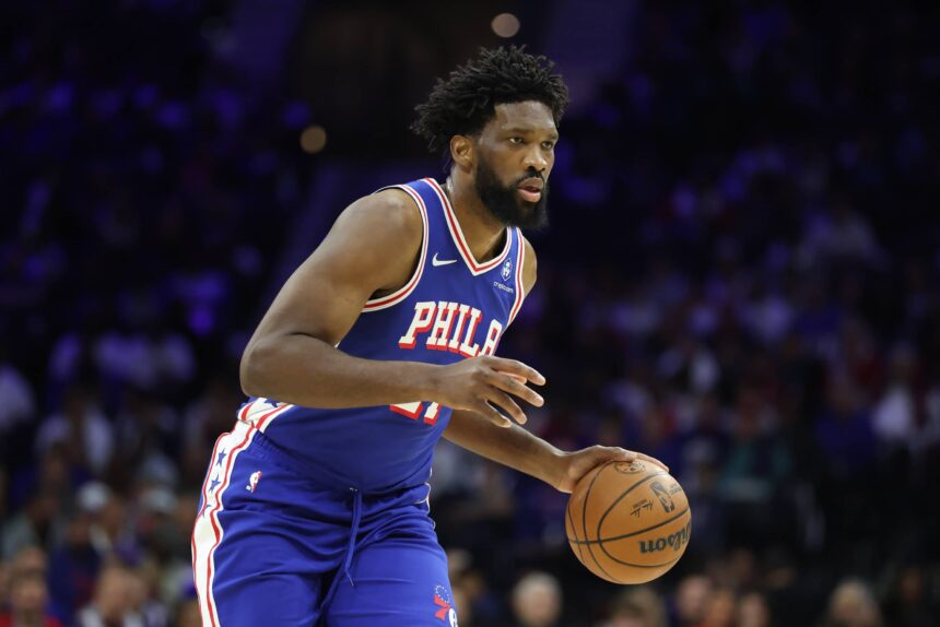 Oct 25, 2025; Philadelphia, Pennsylvania, USA; Philadelphia 76ers center Joel Embiid (21) controls the ball against the Charlotte Hornets during the first quarter at Xfinity Mobile Arena. Mandatory Credit: Bill Streicher-Imagn Images