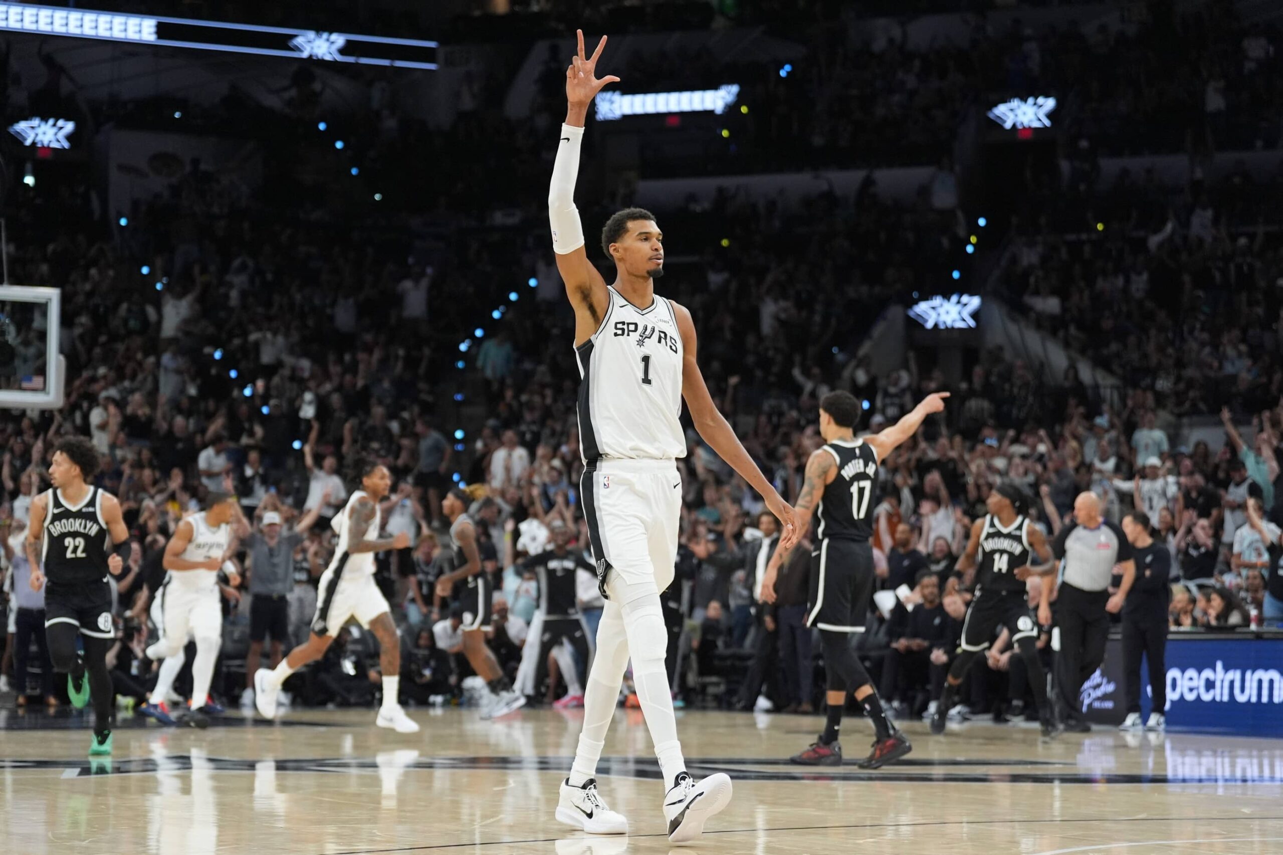 Oct 26, 2025; San Antonio, Texas, USA; San Antonio Spurs forward Victor Wembanyama (1) celebrates in the first half against the Brooklyn Nets at Frost Bank Center. Mandatory Credit: Daniel Dunn-Imagn Images