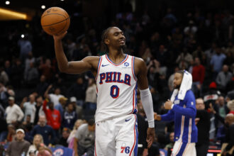 Washington, District of Columbia, USA; Philadelphia 76ers guard Tyrese Maxey (0) celebrates after the final horn against the Washington Wizards at Capital One Arena. Mandatory Credit: Geoff Burke-Imagn Images