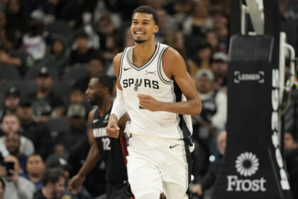 San Antonio, Texas, USA; San Antonio Spurs forward Victor Wembanyama (1) reacts after losing the ball out of bounds during the second half against the Miami Heat at Frost Bank Center. Mandatory Credit: Scott Wachter-Imagn Images