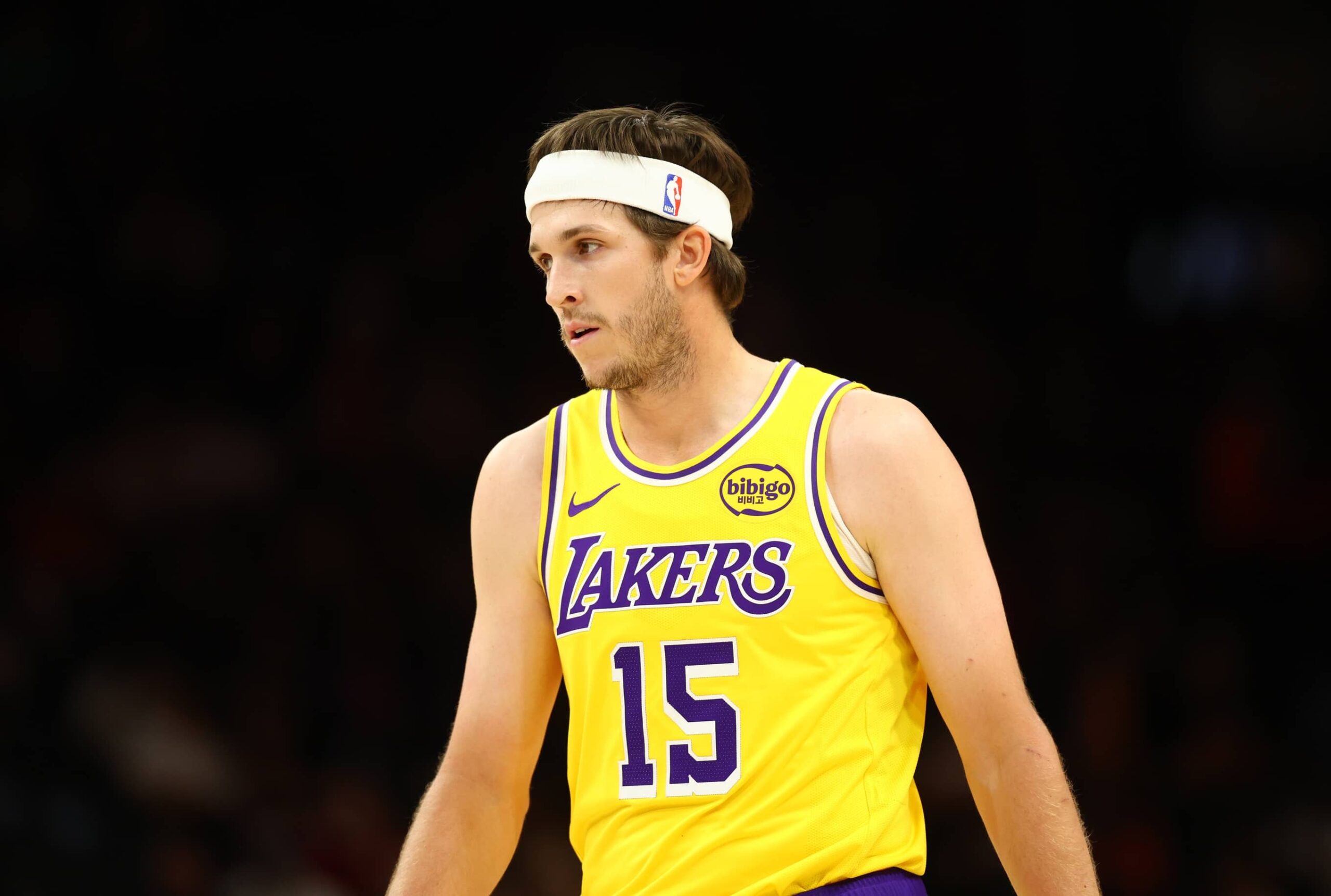 Phoenix, Arizona, USA; Los Angeles Lakers guard Austin Reaves (15) against the Phoenix Suns during an NBA preseason game at Mortgage Matchup Center. Mandatory Credit: Mark J. Rebilas-Imagn Images