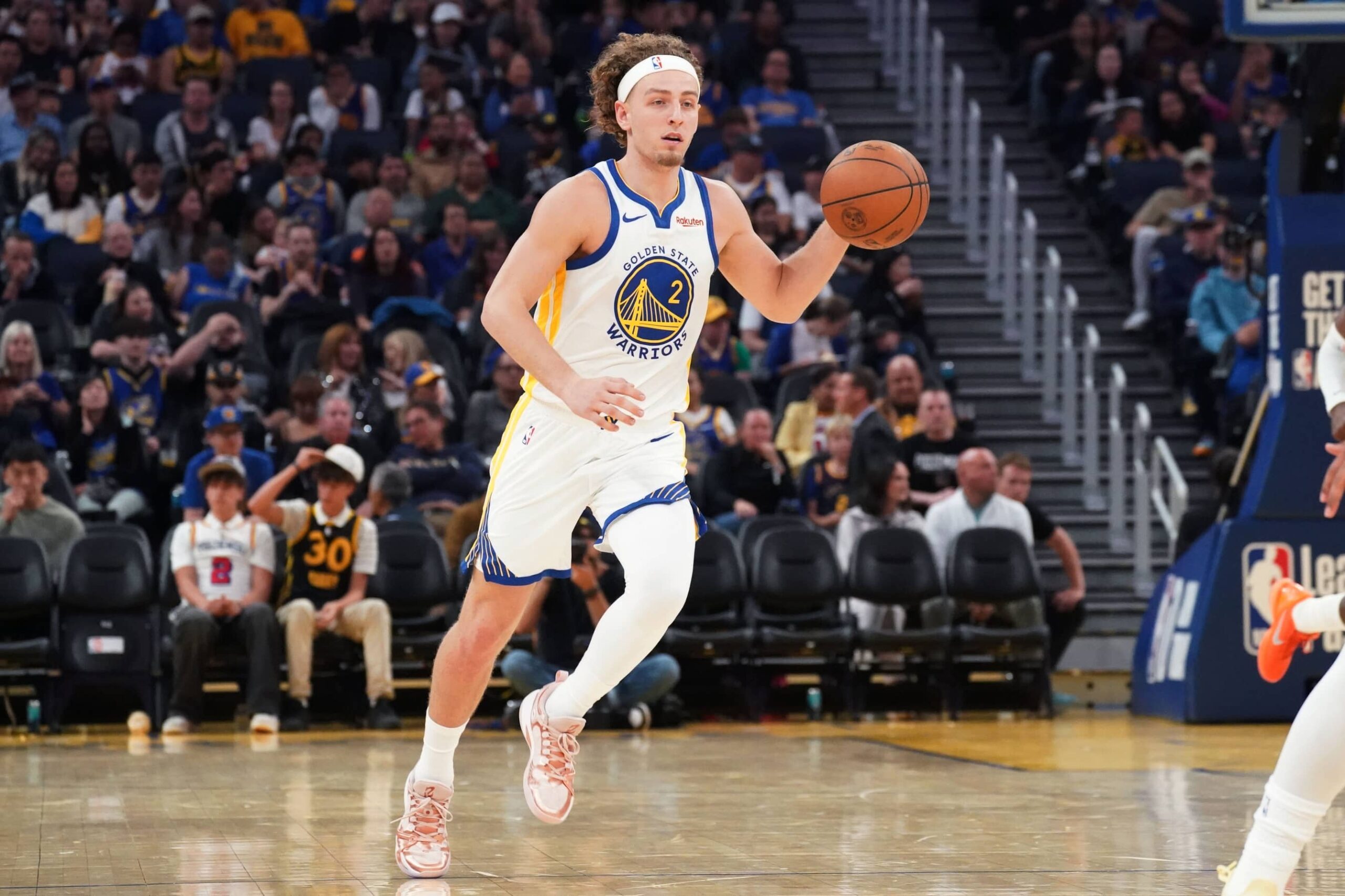 San Francisco, California, USA; Golden State Warriors guard Brandin Podziemski (2) dribbles upcourt against the Los Angeles Lakers in the third quarter at Chase Center. Mandatory Credit: David Gonzales-Imagn Images