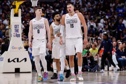 Denver, Colorado, USA; Denver Nuggets guard Jamal Murray (27), center Nikola Jokic (15) and guard Christian Braun (0) in the fourth quarter against the Oklahoma City Thunder during Game 6 of the second round of the 2025 NBA Playoffs at Ball Arena. Mandatory Credit: Isaiah J. Downing-Imagn Images