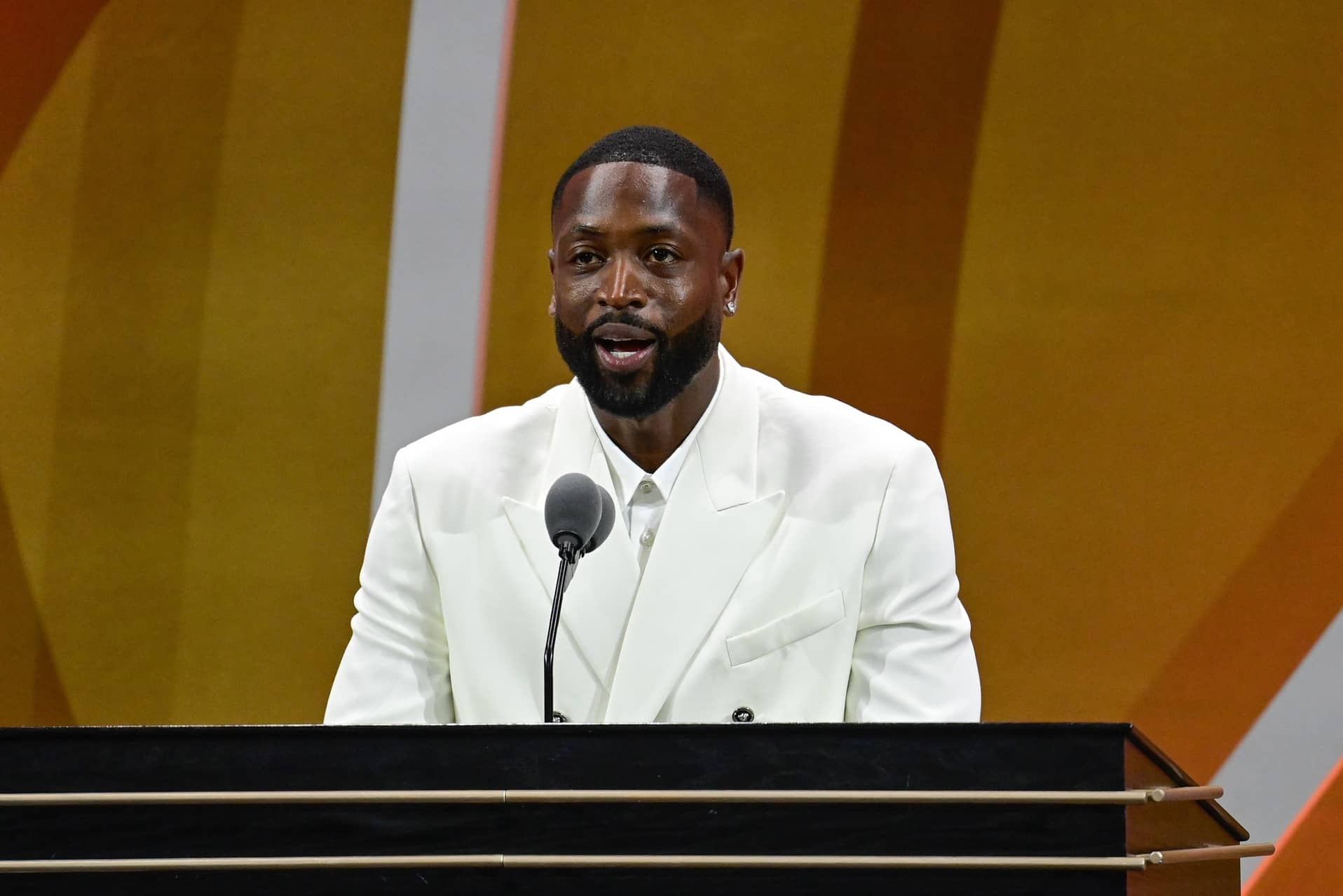 Springfield, MA, USA; Dwyane Wade gives his speech as he is inducted into the 2023 Basketball Hall of Fame at Symphony Hall. Mandatory Credit: Eric Canha-Imagn Images