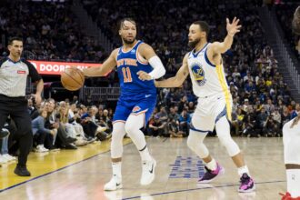San Francisco, California, USA; Golden State Warriors guard Stephen Curry (30) guards New York Knicks guard Jalen Brunson (11) during the first half at Chase Center. Mandatory Credit: John Hefti-Imagn Images