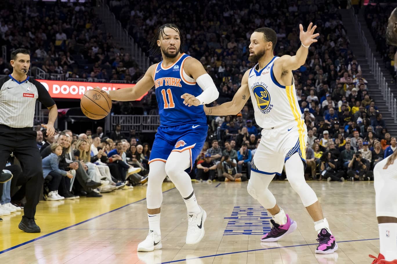 San Francisco, California, USA; Golden State Warriors guard Stephen Curry (30) guards New York Knicks guard Jalen Brunson (11) during the first half at Chase Center. Mandatory Credit: John Hefti-Imagn Images