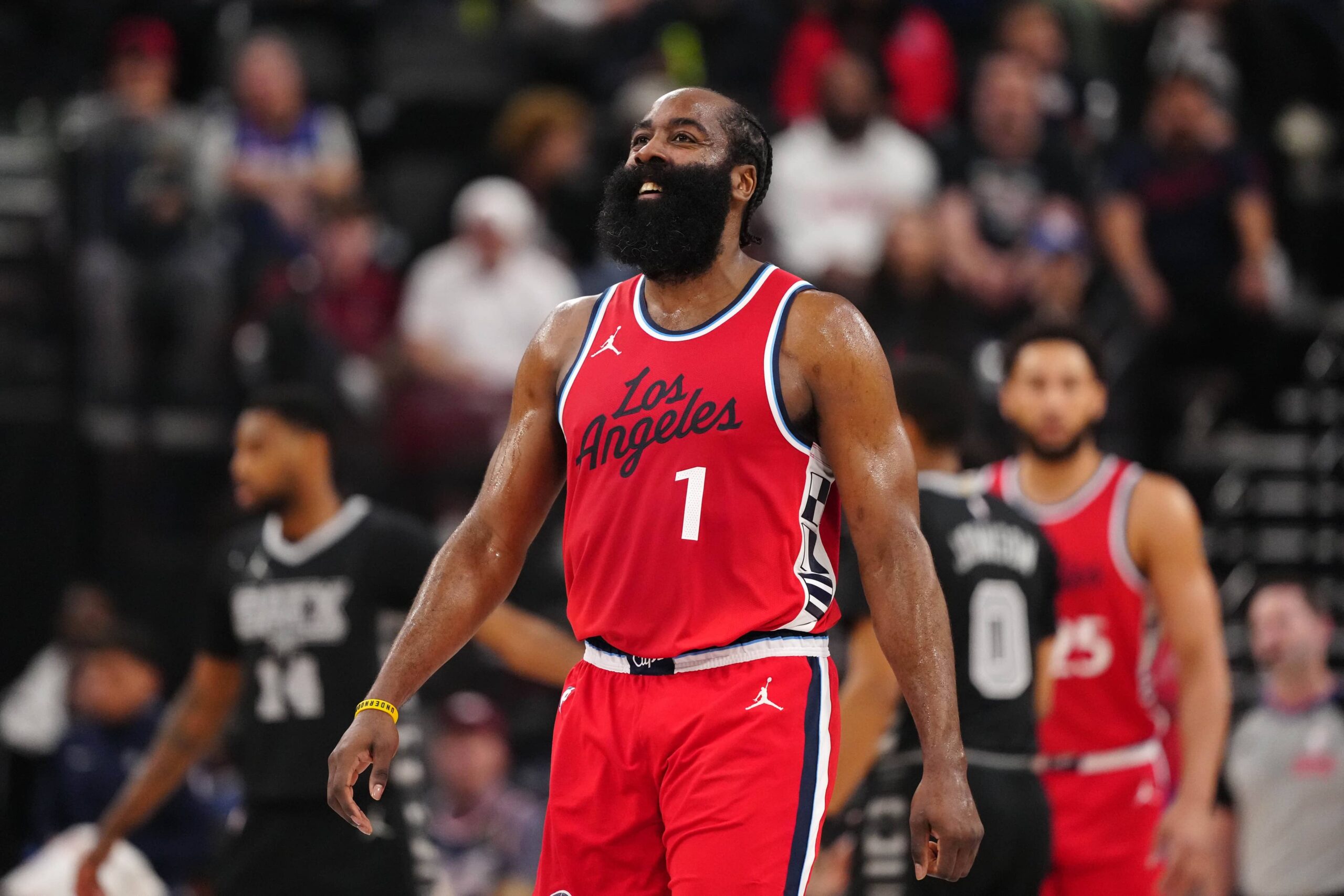 Inglewood, California, USA; LA Clippers guard James Harden (1) reacts against the San Antonio Spurs in the first half at Intuit Dome. Mandatory Credit: Kirby Lee-Imagn Images
