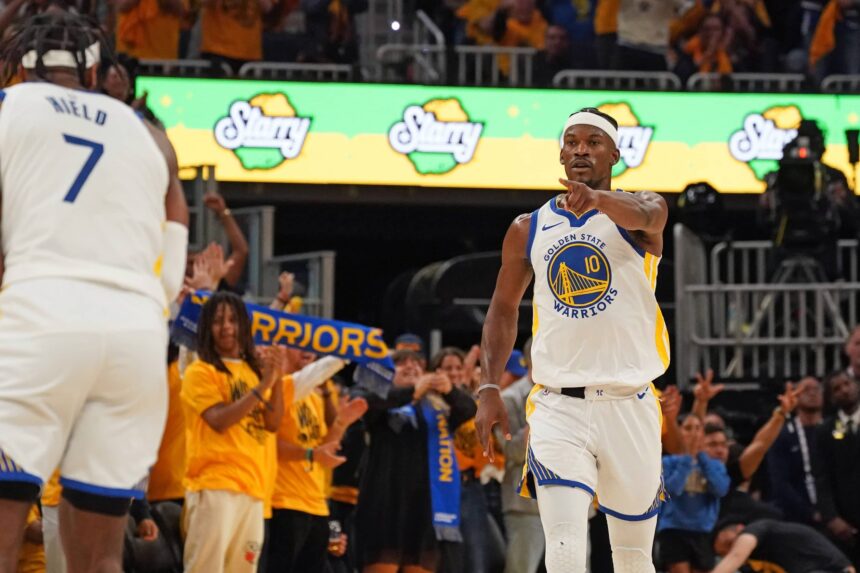 San Francisco, California, USA; Golden State Warriors forward Jimmy Butler III (10) points to guard Buddy Hield (7) during a game against the Minnesota Timberwolves in the third quarter during Game 3 in the second round of the 2025 NBA Playoffs at Chase Center. Mandatory Credit: David Gonzales-Imagn Images