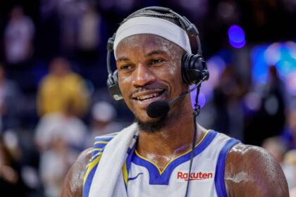 San Francisco, California, USA; Golden State Warriors forward Jimmy Butler III (10) gives an interview after their overtime win against the Denver Nuggets at Chase Center. Mandatory Credit: Bob Kupbens-Imagn Images
