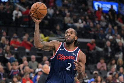 Inglewood, California, USA; Los Angeles Clippers forward Kawhi Leonard (2) stole the ball from Phoenix Suns guard Collin Gillespie (12) and went down court for a basket in the first half at Intuit Dome. Mandatory Credit: Jayne Kamin-Oncea-Imagn Images
