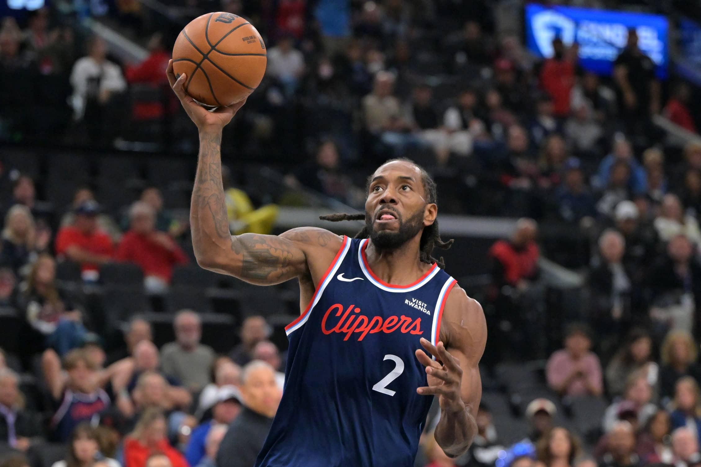 Inglewood, California, USA; Los Angeles Clippers forward Kawhi Leonard (2) stole the ball from Phoenix Suns guard Collin Gillespie (12) and went down court for a basket in the first half at Intuit Dome. Mandatory Credit: Jayne Kamin-Oncea-Imagn Images
