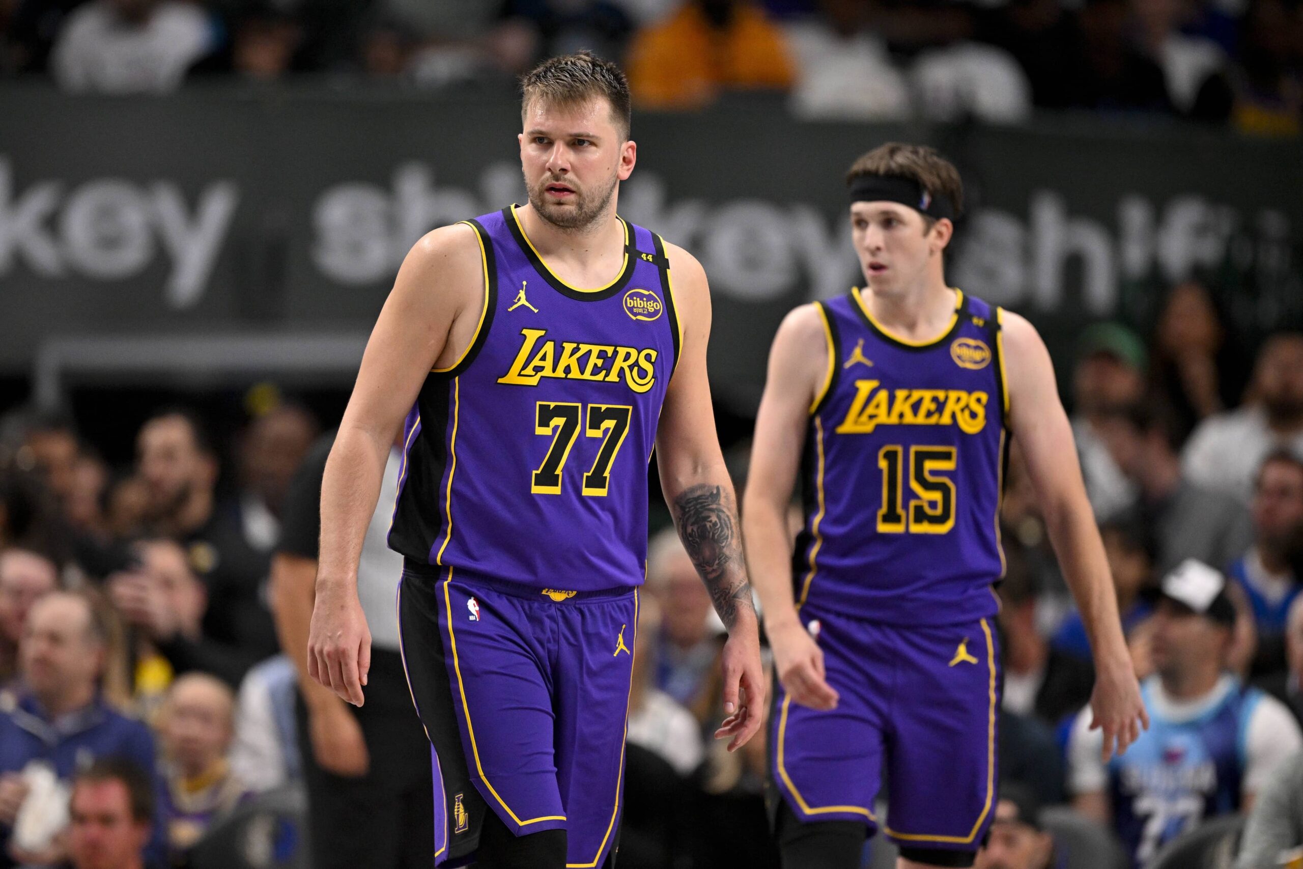 Dallas, Texas, USA; Los Angeles Lakers guard Luka Doncic (77) and guard Austin Reaves (15) during the game between the Dallas Mavericks and the Los Angeles Lakers at American Airlines Center. Mandatory Credit: Jerome Miron-Imagn Images