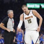 Oklahoma City, Oklahoma, USA; Denver Nuggets center Nikola Jokic (15) talks to an official during a break in play against the Oklahoma City Thunder in the second quarter during Game 7 of the second round of the 2025 NBA Playoffs at Paycom Center. Mandatory Credit: Alonzo Adams-Imagn Images