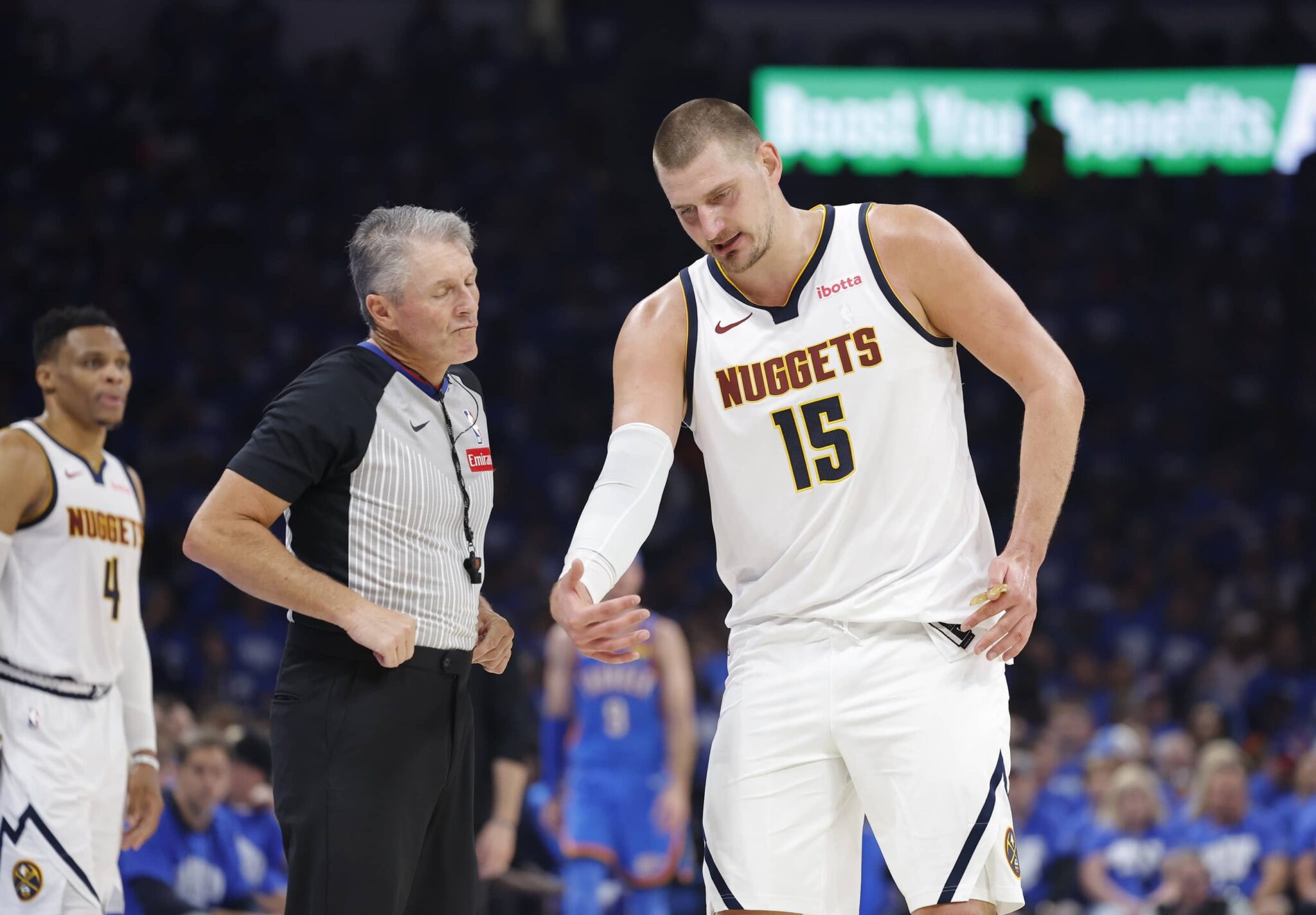 Oklahoma City, Oklahoma, USA; Denver Nuggets center Nikola Jokic (15) talks to an official during a break in play against the Oklahoma City Thunder in the second quarter during Game 7 of the second round of the 2025 NBA Playoffs at Paycom Center. Mandatory Credit: Alonzo Adams-Imagn Images