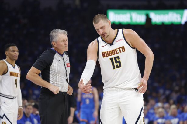 Oklahoma City, Oklahoma, USA; Denver Nuggets center Nikola Jokic (15) talks to an official during a break in play against the Oklahoma City Thunder in the second quarter during Game 7 of the second round of the 2025 NBA Playoffs at Paycom Center. Mandatory Credit: Alonzo Adams-Imagn Images