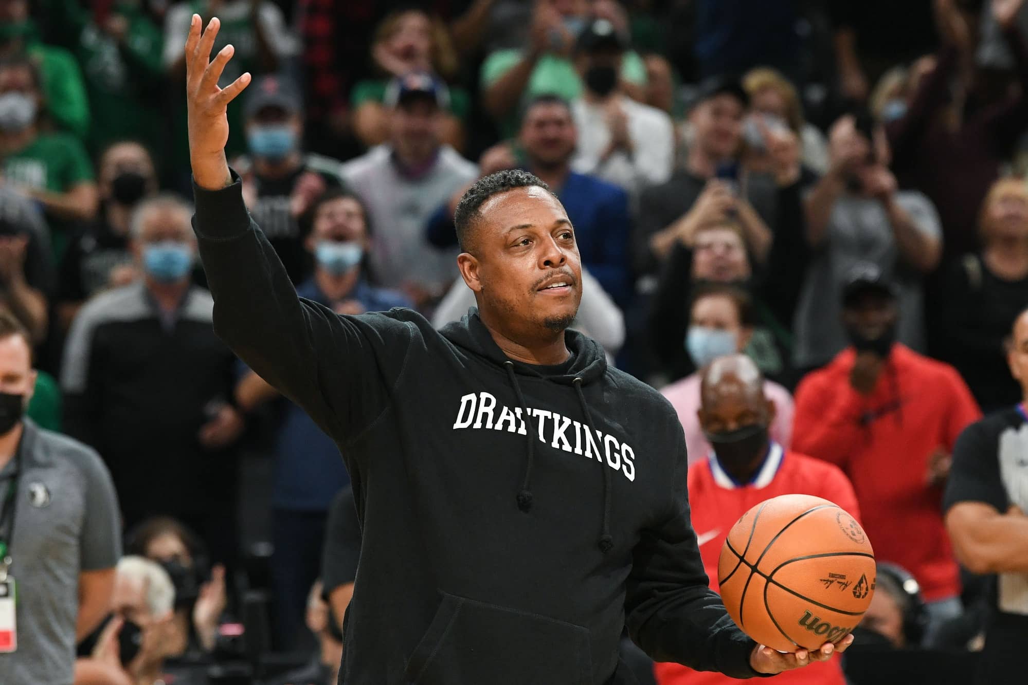 Boston, Massachusetts, USA; Former Boston Celtics player Paul Pierce carries the game ball before a game against the Toronto Raptors at the TD Garden. Mandatory Credit: Brian Fluharty-Imagn Images