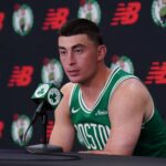 Boston, MA, USA; Boston Celtics guard Payton Pritchard (11) talks with reporters during media day at the Auerbach Center. Mandatory Credit: David Butler II-Imagn Images
