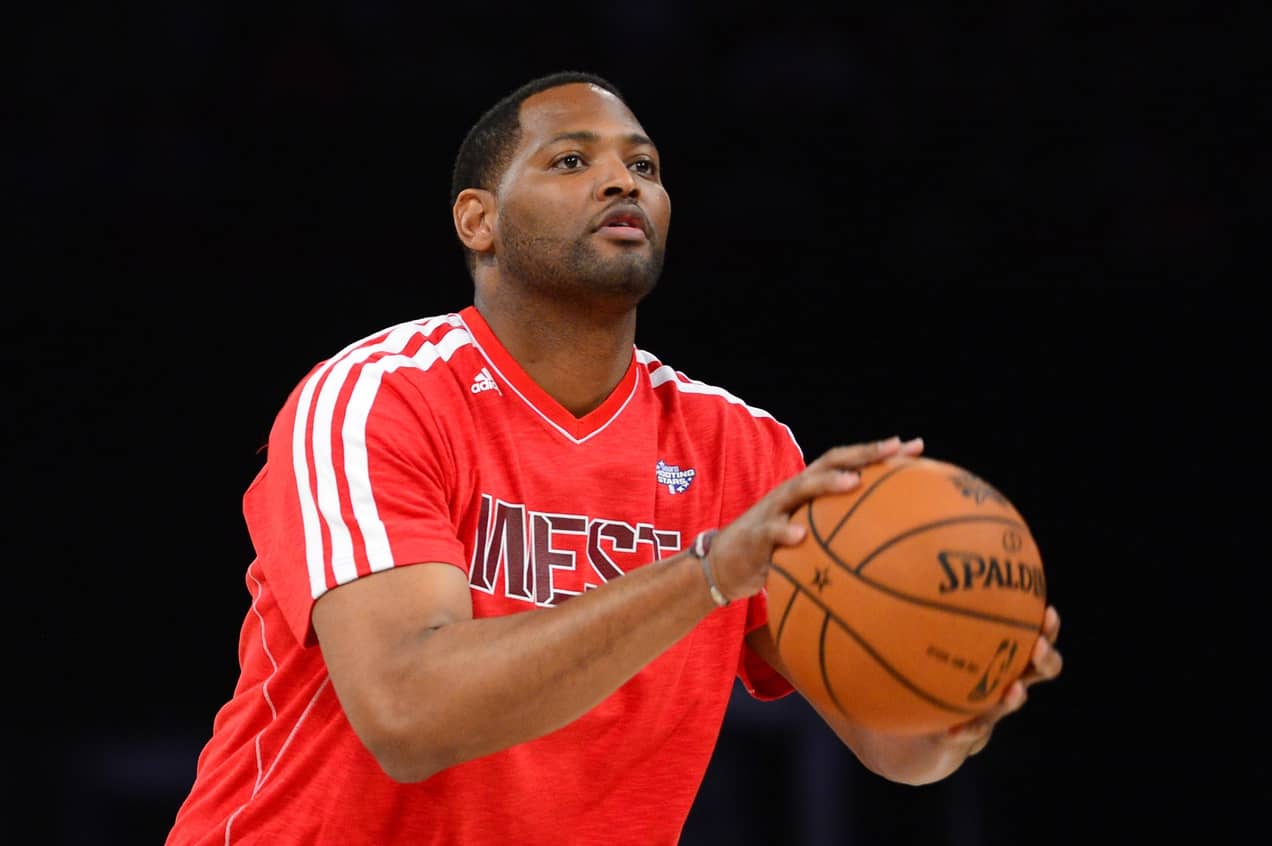 Houston, TX, USA; Former NBA player Robert Horry shoots during the NBA All-Star shooting stars competition at the Toyota Center. Mandatory Credit: Bob Donnan-Imagn Images