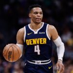 Denver, Colorado, USA; Denver Nuggets guard Russell Westbrook (4) controls the ball in the first quarter against the Los Angeles Lakers at Ball Arena. Mandatory Credit: Isaiah J. Downing-Imagn Images
