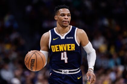 Denver, Colorado, USA; Denver Nuggets guard Russell Westbrook (4) controls the ball in the first quarter against the Los Angeles Lakers at Ball Arena. Mandatory Credit: Isaiah J. Downing-Imagn Images