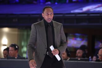 Indianapolis, IN, USA; Team Stephen A coach Stephen A. Smith looks on against Team Shannon during the All Star Celebrity Game at Lucas Oil Stadium. Mandatory Credit: Trevor Ruszkowski-Imagn Images
