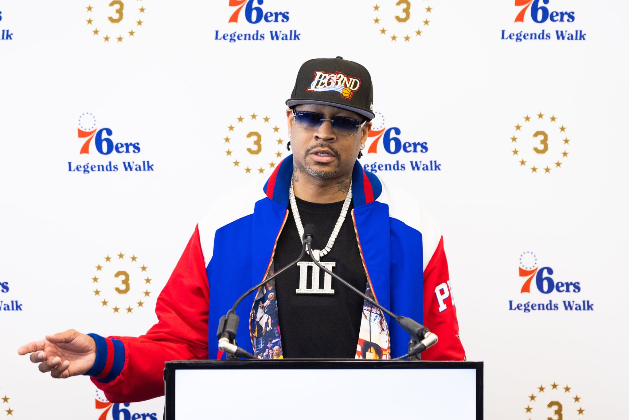 Apr 12, 2024; Camden, NJ, USA; Philadelphia 76ers great Allen Iverson speaks at the podium during the unveiling of a statue honoring him in a ceremony at Penn Medicine Philadelphia 76ers Training Complex. Mandatory Credit: Bill Streicher-Imagn Images
