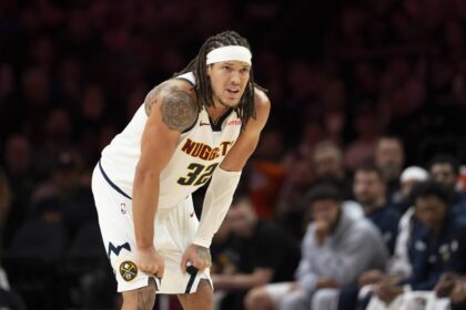 Denver Nuggets forward Aaron Gordon (32) looks on against the Minnesota Timberwolves in the second half at Target Center.