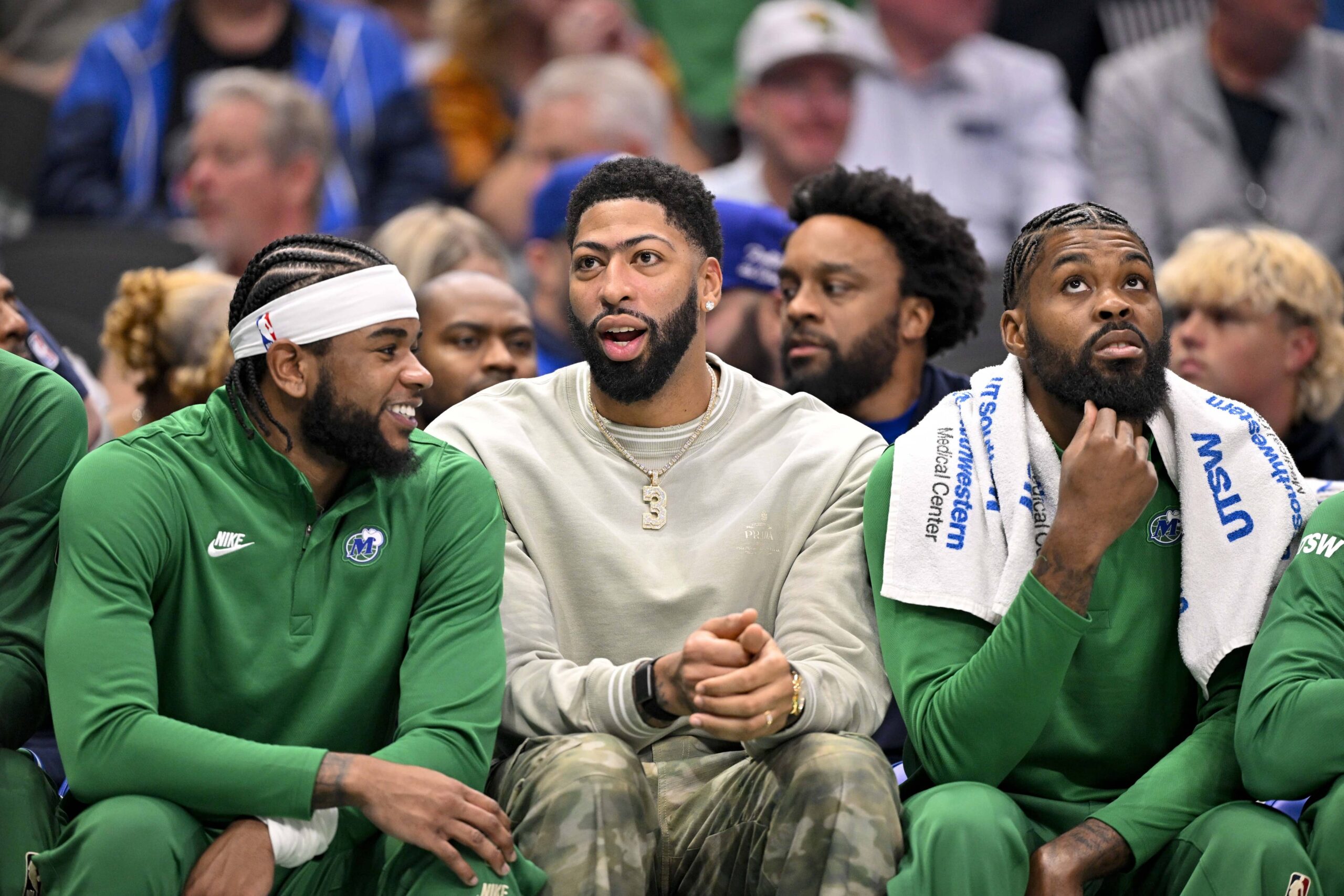 forward Anthony Davis (3) and forward Naji Marshall (13) look on during the first quarter against the Phoenix Suns at the American Airlines Center.