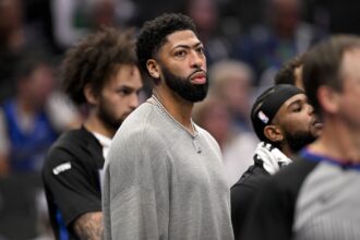 Dallas Mavericks forward Anthony Davis (3) looks on from the bench during the second half against the New York Knicks at the American Airlines Center. Mandatory Credit: Jerome Miron-Imagn Images