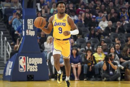 San Francisco, California, USA; Los Angeles Lakers guard Bronny James (9) dribbles upcourt against the Golden State Warriors in the first quarter at Chase Center. Mandatory Credit: David Gonzales-Imagn Images