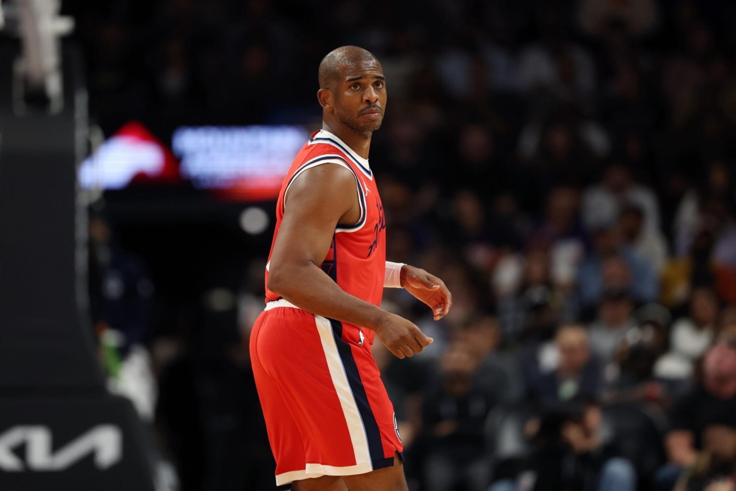 Nov 6, 2025; Phoenix, Arizona, USA; Los Angeles Clippers guard Chris Paul (3) against the Phoenix Suns at the Mortgage Matchup Center. Mandatory Credit: Mark J. Rebilas-Imagn Images