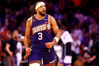 Phoenix, Arizona, USA; Phoenix Suns forward Dillon Brooks (3) reacts to a play during the second half against the Sacramento Kings at the Mortgage Matchup Center. Mandatory Credit: Mark J. Rebilas-Imagn Images