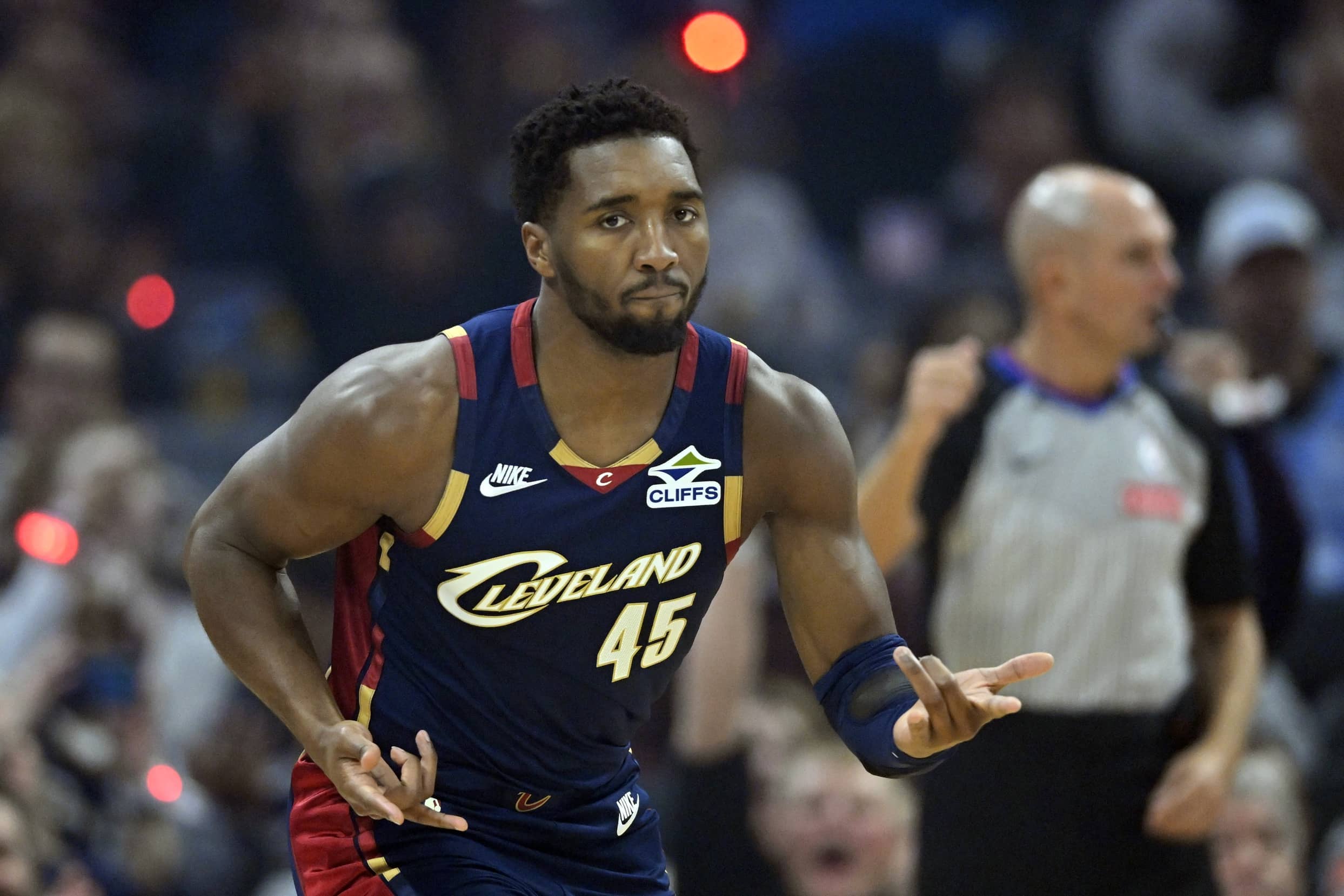 Cleveland Cavaliers guard Donovan Mitchell (45) celebrates his three-point basket in the first quarter against the Philadelphia 76ers at Rocket Arena.