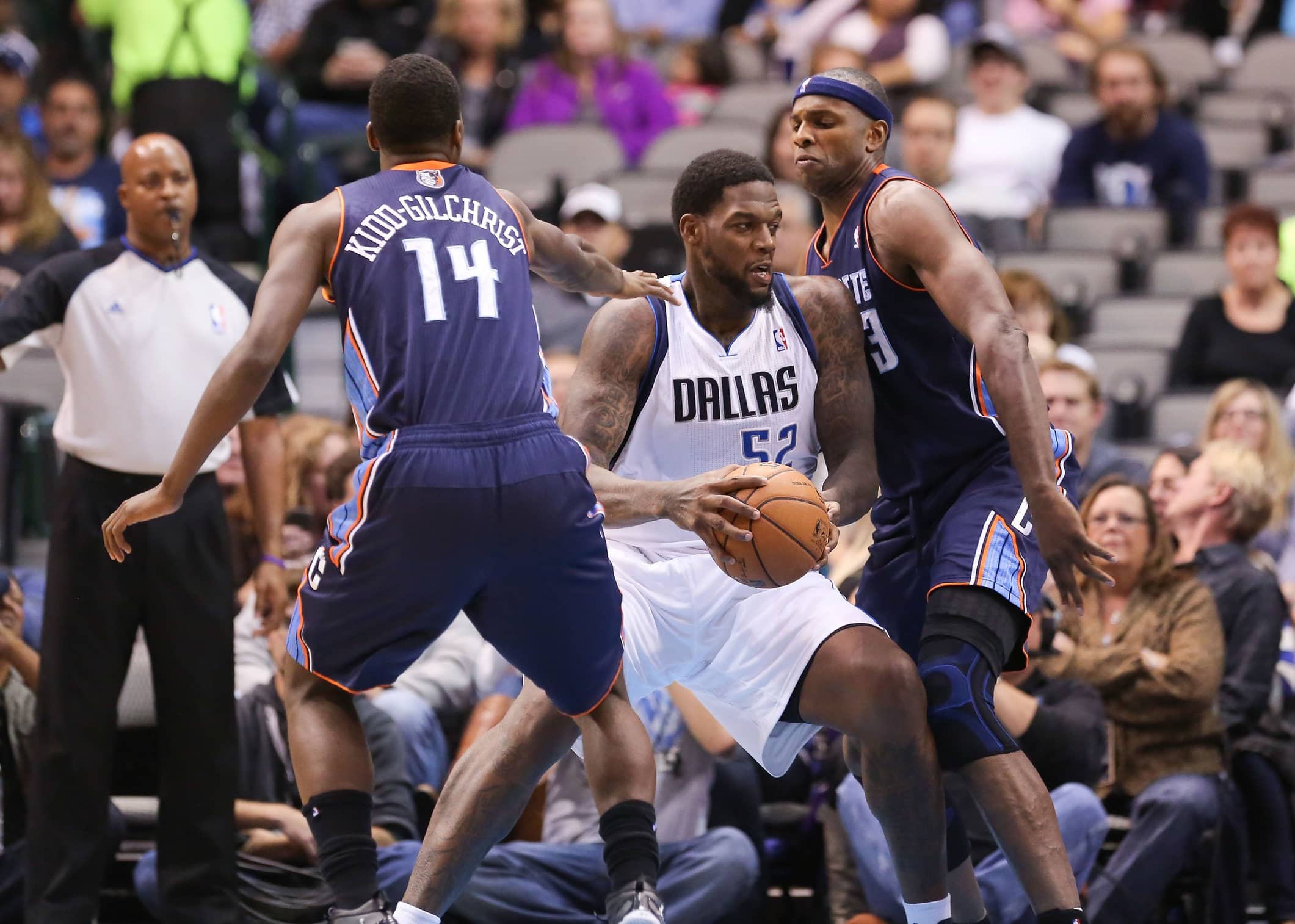 Dallas Mavericks center Eddy Curry (52) makes a move on Charlotte Bobcats center Brendan Haywood (33) during the first quarter at the American Airlines Center.
