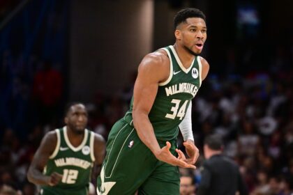 Cleveland, Ohio, USA; Milwaukee Bucks forward Giannis Antetokounmpo (34) celebrates after hitting a three point basket against the Cleveland Cavaliers during the second half at Rocket Arena. Mandatory Credit: Ken Blaze-Imagn Images