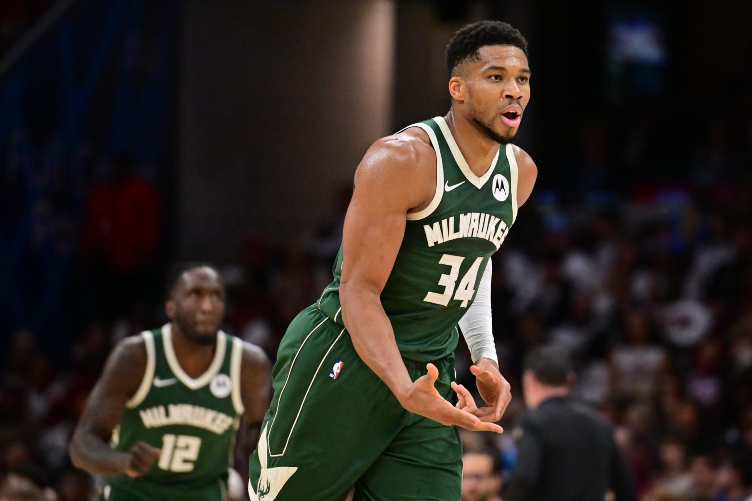 Cleveland, Ohio, USA; Milwaukee Bucks forward Giannis Antetokounmpo (34) celebrates after hitting a three point basket against the Cleveland Cavaliers during the second half at Rocket Arena. Mandatory Credit: Ken Blaze-Imagn Images