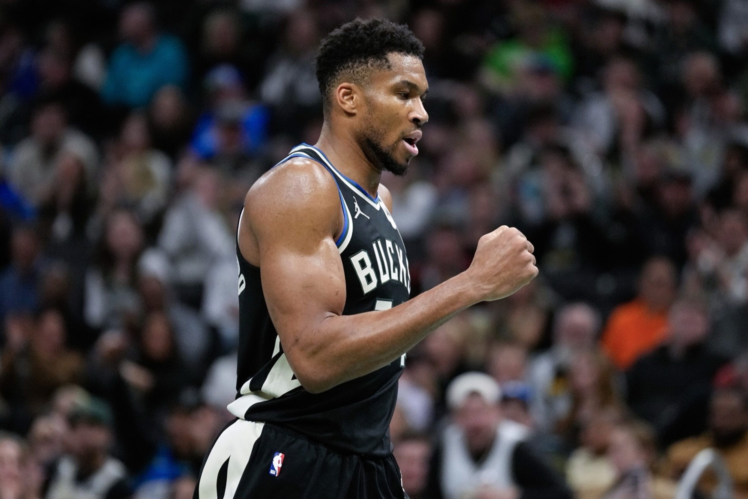 Nov 14, 2025; Milwaukee, Wisconsin, USA; Milwaukee Bucks forward Giannis Antetokounmpo (34) punts his fist following a Milwaukee Bucks score during the third quarter against the Charlotte Hornets at Fiserv Forum. Mandatory Credit: Jeff Hanisch-Imagn Images