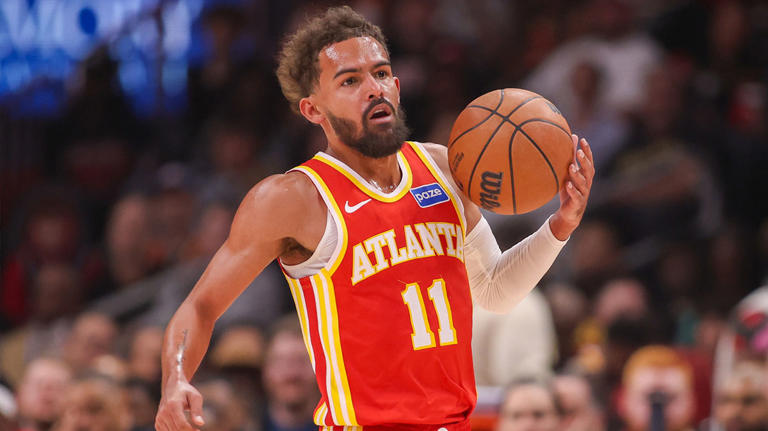 Oct 22, 2025; Atlanta, Georgia, USA; Atlanta Hawks guard Trae Young (11) dribbles against the Toronto Raptors in the first quarter at State Farm Arena. Mandatory Credit: Brett Davis-Imagn Images