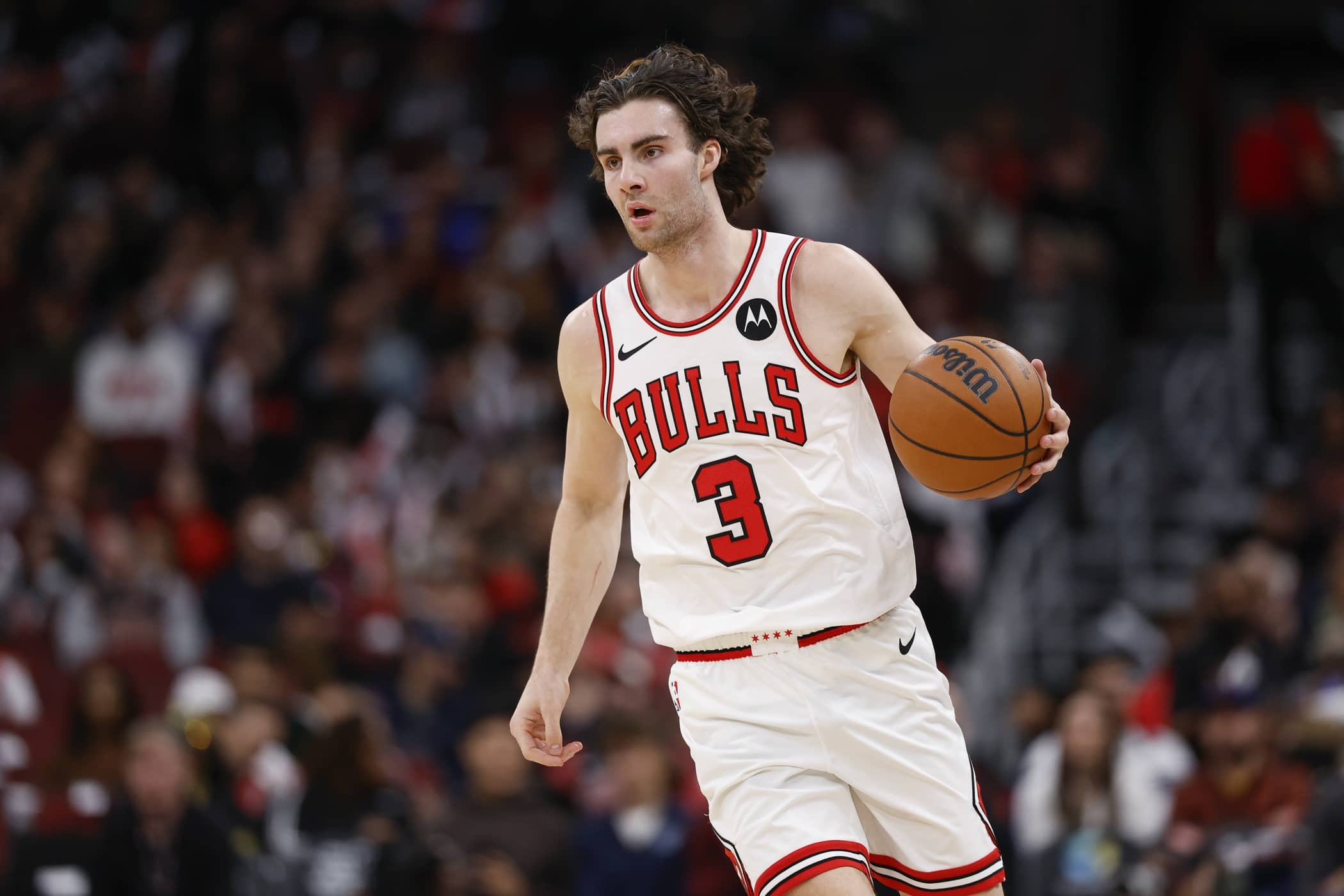 Chicago Bulls guard Josh Giddey (3) brings the ball up court against the Washington Wizards during the first half at United Center.