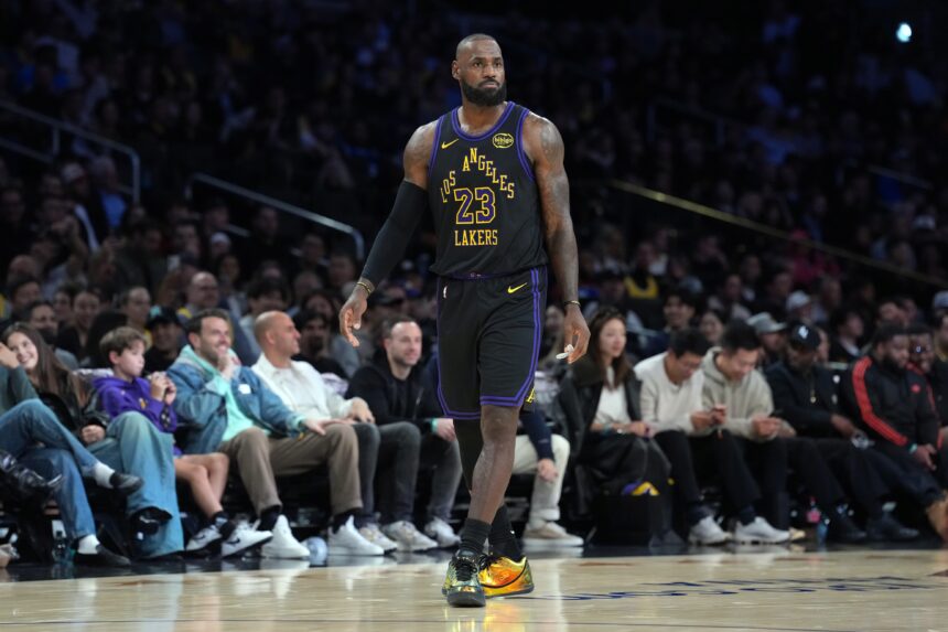 Nov 18, 2025; Los Angeles, California, USA; Los Angeles Lakers forward LeBron James (23) reacts against the Utah Jazz in the fourth quarter at Crypto.com Arena. Mandatory Credit: Kirby Lee-Imagn Images