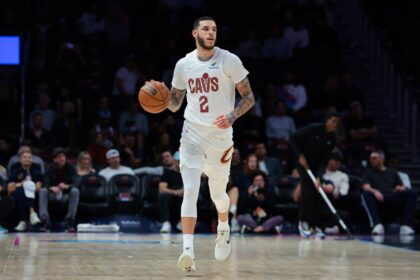 Cleveland Cavaliers guard Lonzo Ball (2) dribbles the basketball against the Miami Heat during the first quarter at Kaseya Center.