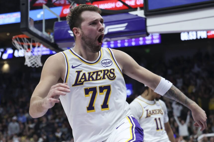 Los Angeles Lakers guard Luka Doncic (77) reacts to a play against the Utah Jazz during the second quarter at Delta Center.